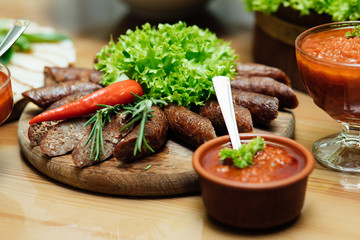 Food for corporate events, parties, conferences, holidays. Cold appetizers and salads on the wedding table. Plate with original appetizer on beautifully decorated table in the restaurant