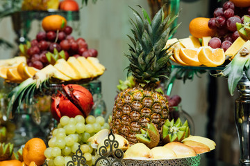 Background of fresh fruit. Fresh organic fruits background. Healthy eating concept. Fresh, exotic,...