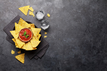 Mexican nachos chips and tequila