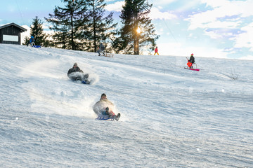 There is a toboggan lift in the winter sports area. Winter fun for families in the sunshine.