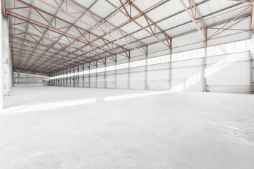 Interior of empty warehouse or garage in white colors