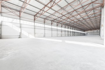 Interior of empty warehouse or garage in white colors