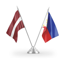 Philippines and Latvia table flags isolated on white 3D rendering