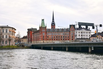 Fototapeta na wymiar Stockholm, Sweden- January 2020. View from the water to the old city of Stockholm. Beautiful cityscape of the old city. The capital of Sweden. landmarks of Stockholm city. Scandinavia. North Europe 