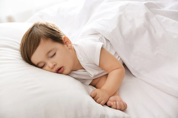 Obraz na płótnie Canvas Cute little baby peacefully sleeping at home. Bedtime