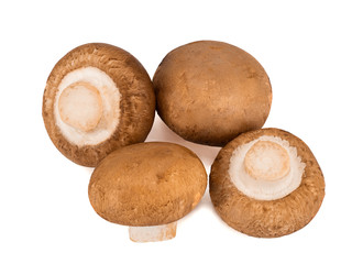 Four champignons isolated on a white background