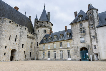 view of the castle and gardens of sully sur loire