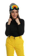 Woman wearing stylish winter sport clothes on white background