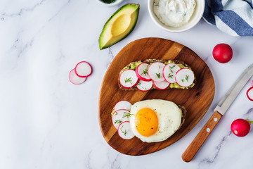 Radish avocado and egg avocado  rye sandwiches
