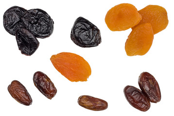 Prune, dried apricots, dried dates isolated on white background, top view
