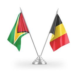 Belgium and Guyana table flags isolated on white 3D rendering