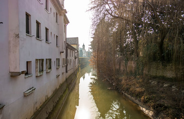 Canal view around the medieval walls of the town of Este in the province of Padua, Veneto - Italy
