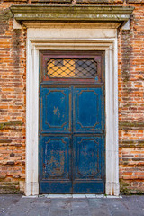 Fototapeta na wymiar Old wooden gate of blue color