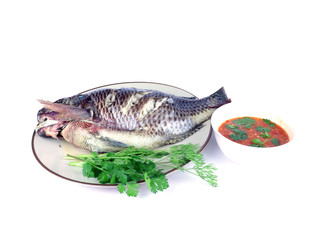 Fish and water dip with vegetables Isolated on white.