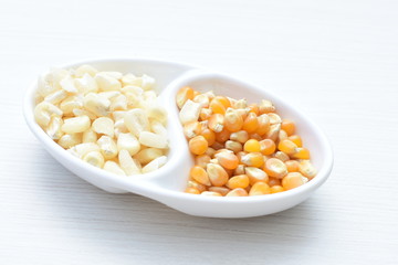 grains of natural corn in containers