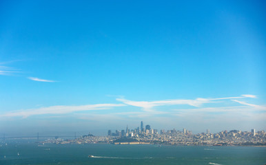 Fototapeta na wymiar Modern coastal city skyline with blue sky