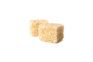 Brown sugar cubes isolated on white background, close up