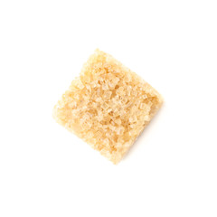 Brown sugar cube isolated on white background, close up