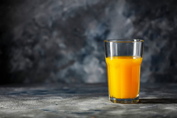 Fresh orange juice and copy space for your product. 