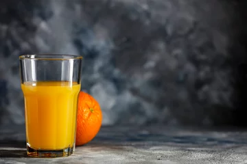 Foto op Canvas Fresh orange juice and copy space for your product.  © magdal3na