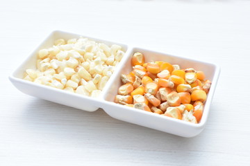 grains of natural corn in containers
