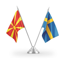 Sweden and North Macedonia table flags isolated on white 3D rendering