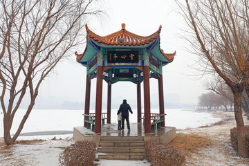 Tourists in the pavilion in snow, Luannan County, Hebei Province, China