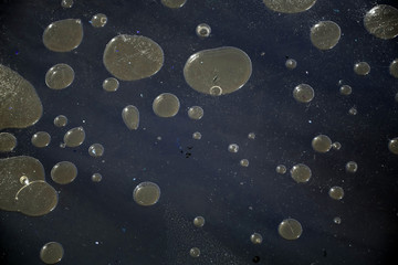 abstract air bubbles under ice