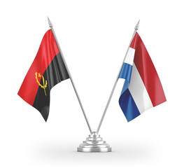 Netherlands and Angola table flags isolated on white 3D rendering