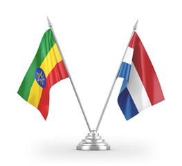 Netherlands and Ethiopia table flags isolated on white 3D rendering