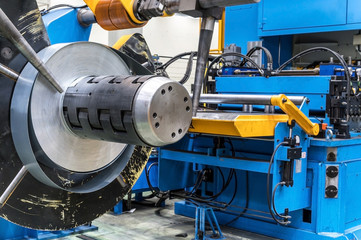 Industrial metal sheet coils connected with metal sheet profile forming machine .