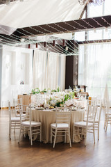 wedding table with flowers  in restaurant