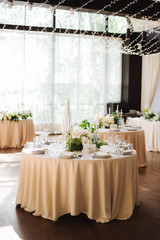 wedding table with flowers  in restaurant