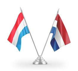 Netherlands and Luxembourg table flags isolated on white 3D rendering