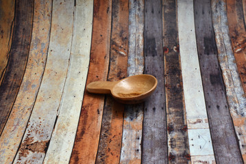 A small brown spoon made of wood