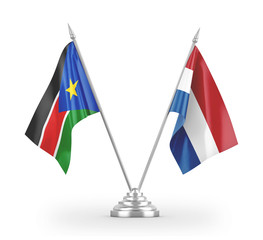 Netherlands and South Sudan table flags isolated on white 3D rendering