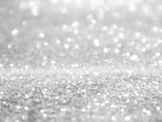 Background christmas snowing. Glitter lights snow winter.Bokeh White on Blurred Background.