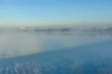 City Kremenchug in fog on autumn day