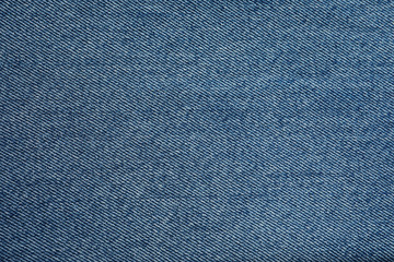 Fototapeta na wymiar Texture of blue jeans as background, closeup