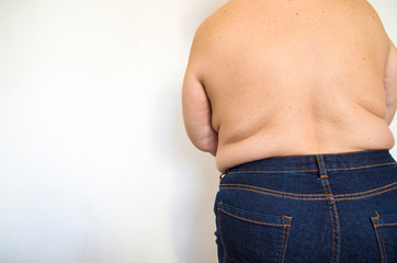 Naklejka premium Shows excess waist fat