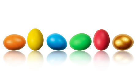 Set of Easter eggs reflecting on the white background