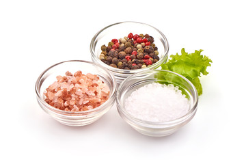 Spices for cooking, peppercorn mix and sea salt, isolated on white background