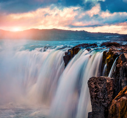 Breathtaking summer sunrise on Selfoss Waterfall. Fantastic outdoor scene of Jokulsa a Fjollum...