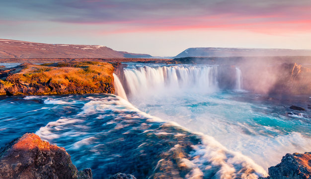 Spectacular sunrise on Skjalfandafljot river, Iceland, Europe. Magnificent summer view of Godafoss waterfall. Travel to Iceland..