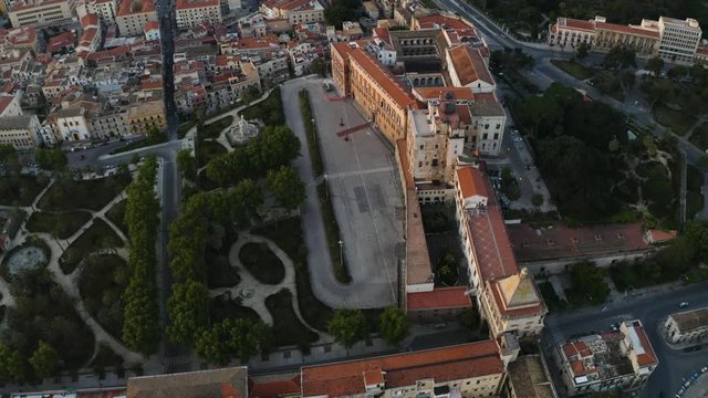 Cinematic flight in the pre-dawn hour over the Palazzo dei Normanni, and Cappella Palatina in the historic part of Palermo. Sicily. Aerial shoot