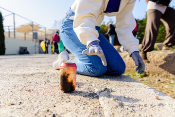 Group of activists clean and collect garbage from nature to keep the pollution environment clean