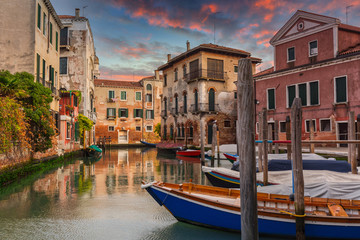 Canals of Venice city with traditional colorful architecture, Italy