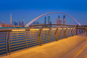 Dubai city skyline at night. view of Tolerance bridge
