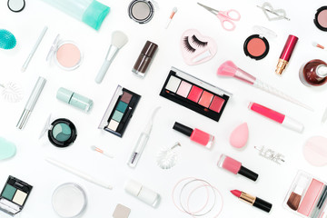 Feminine makeup aqua mente and pink palette accessories with nail polish manicure tools on white background. Flat lay pattern with copy space, beauty and cosmetics blogger concept