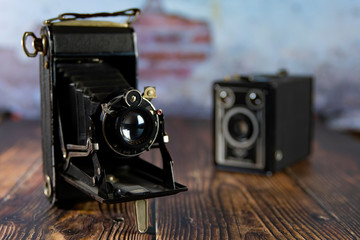 Still life with nostalgic and Box cameras Timeless photography Variety of old antique cameras.